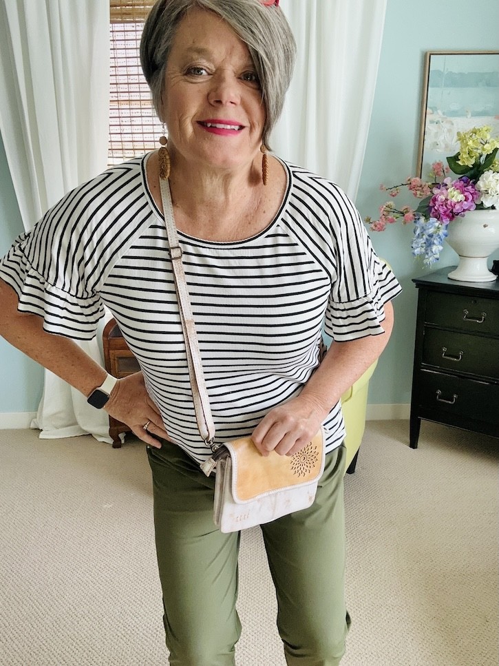 green golf pants outfit with striped t shirt