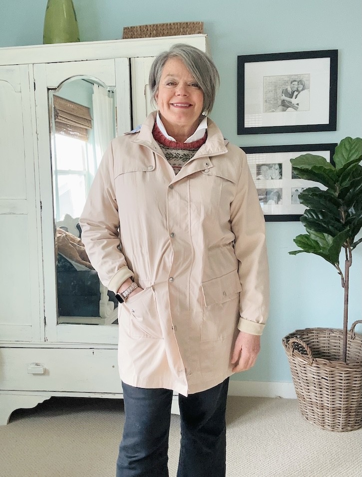 Easy layered outfit for cooler days after 50 with lightweight raincoat and flats
