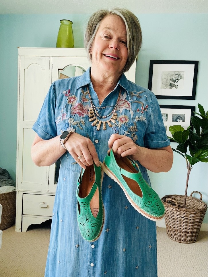 embroidered denim dress outfit with linen jacket and green flats for spring
