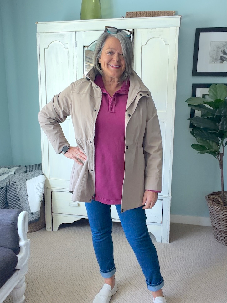 Lightweight rain jacket layered over a tunic for October in Italy