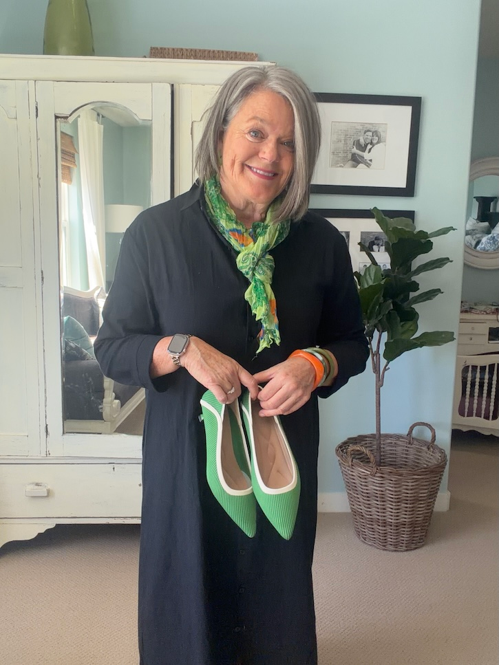 Black shirt dress outfit with green kitten heel shoes and colorful accessories