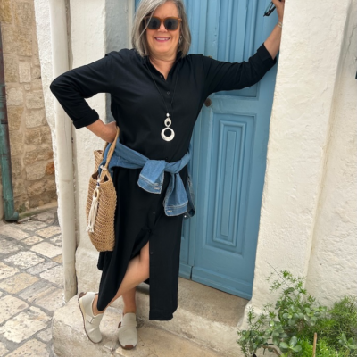 exploring bari Italy in black shirt dress women over 50